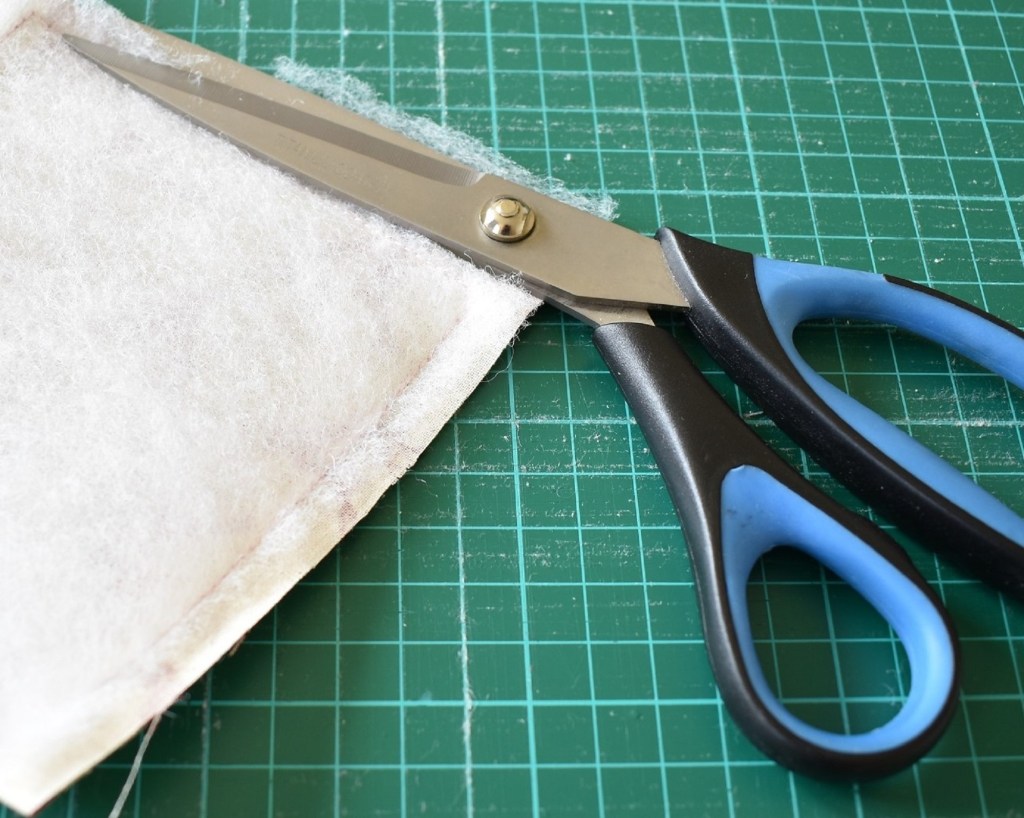 Trim off excess wadding round the edges