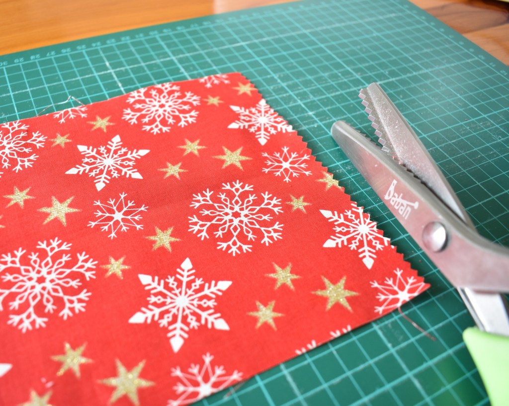 Trim the short edges with pinking shears