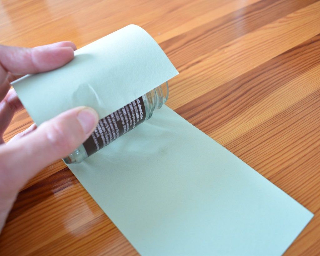  Roll your card around the glass jar