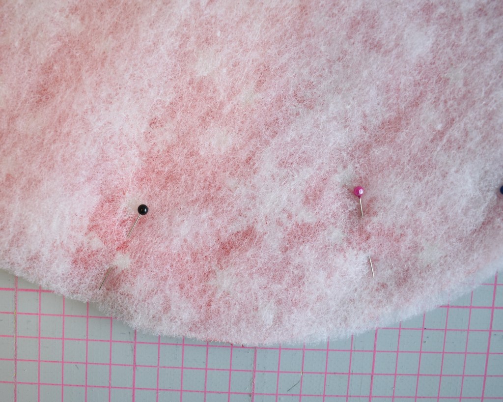 Pin all the way round leaving a gap of 12cm for turning