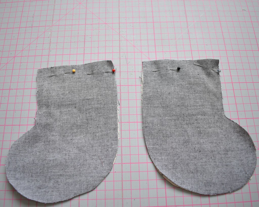 Lay lining on top of main fabric and pin along the top