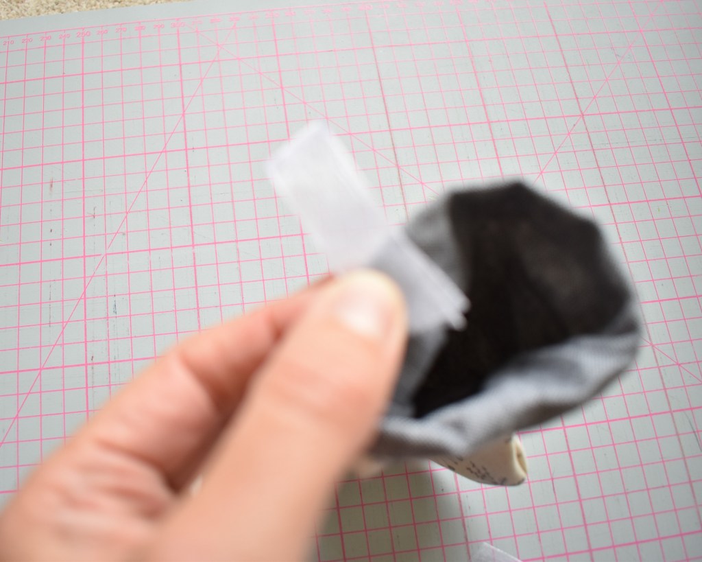 Place inside back of stocking, attach 1cm from the top edge